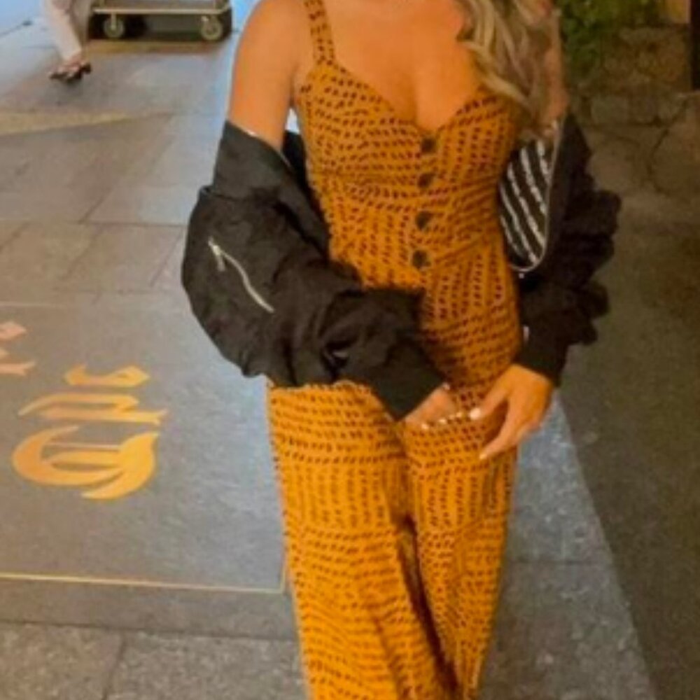 Urban outfitter tan and black jumpsuit sz small